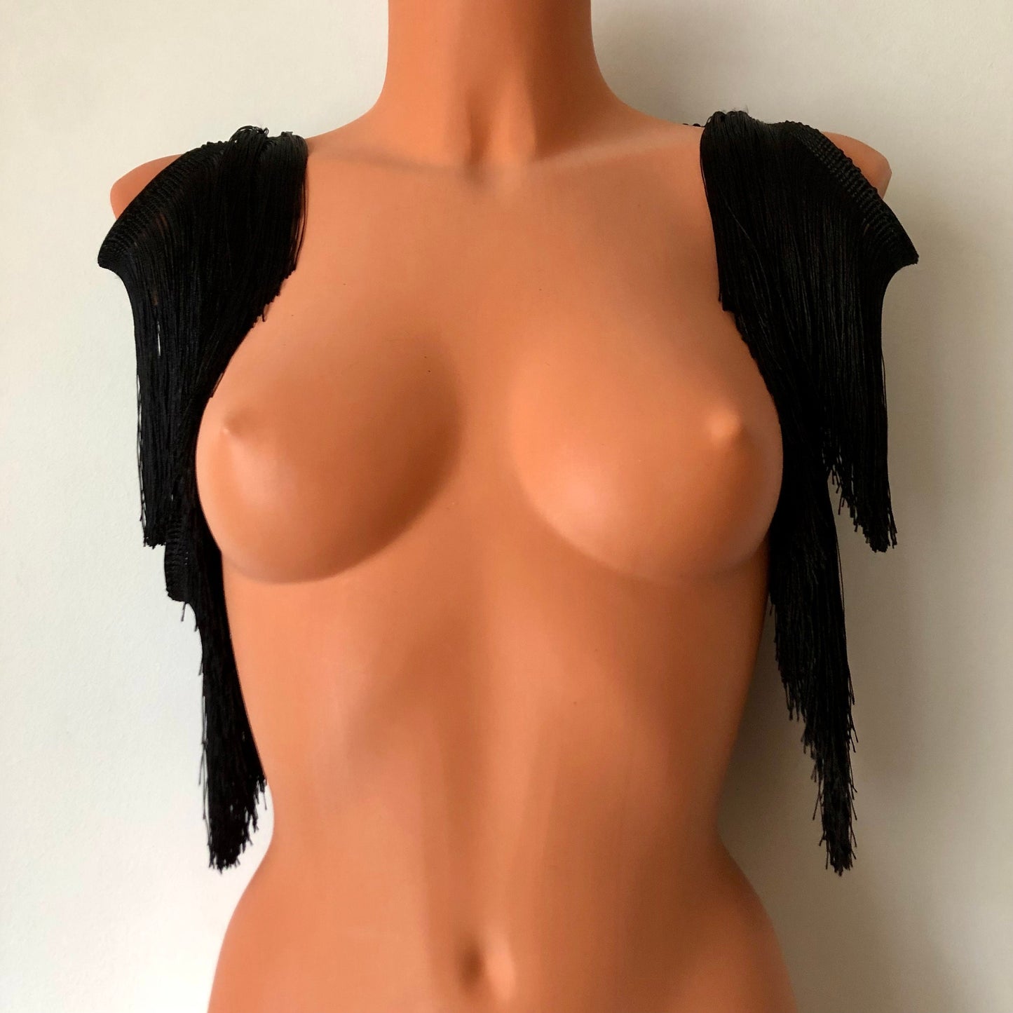 Black shimmy fringe shrug bolero capelet on a mannequin - front