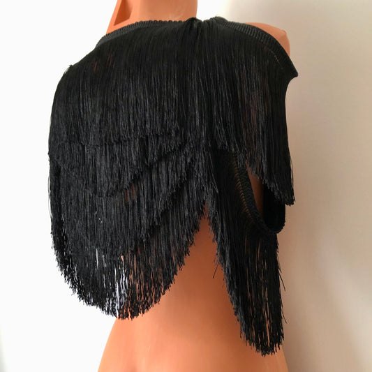 Black shimmy fringe shrug bolero capelet on a mannequin - back diagonal