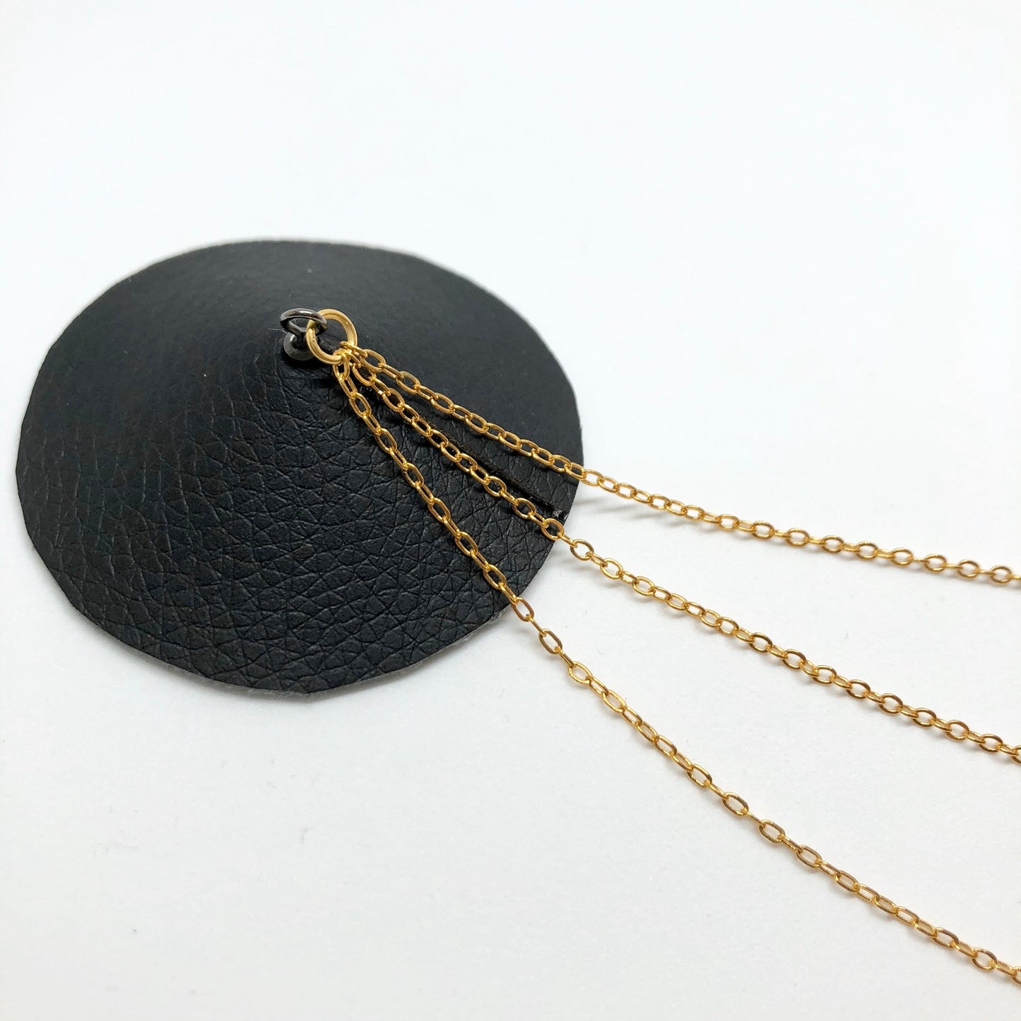 Gold chain black faux leather burlesque pasties nipple covers linked with gold chains
