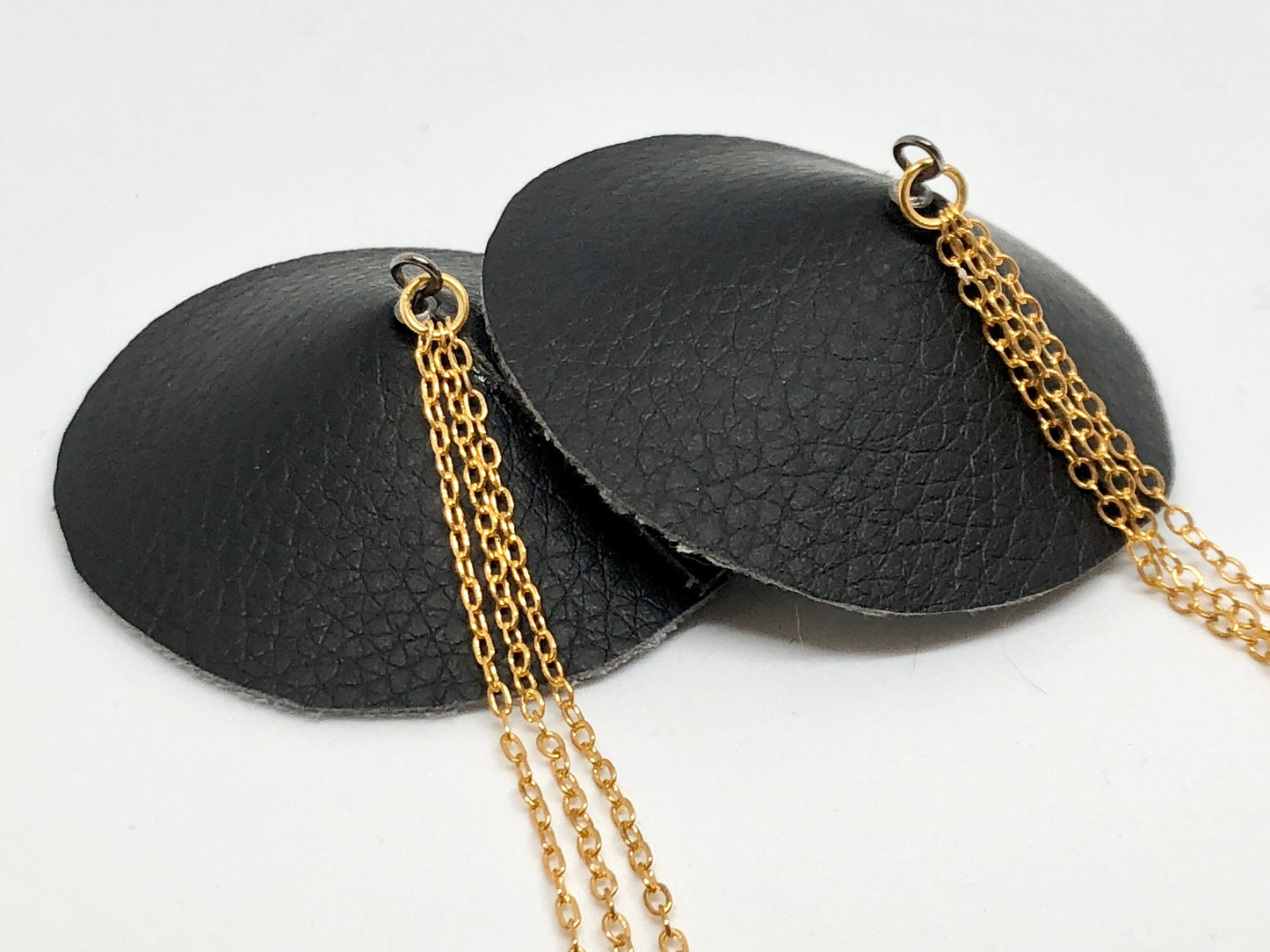 Gold chain black faux leather burlesque pasties nipple covers linked with gold chains