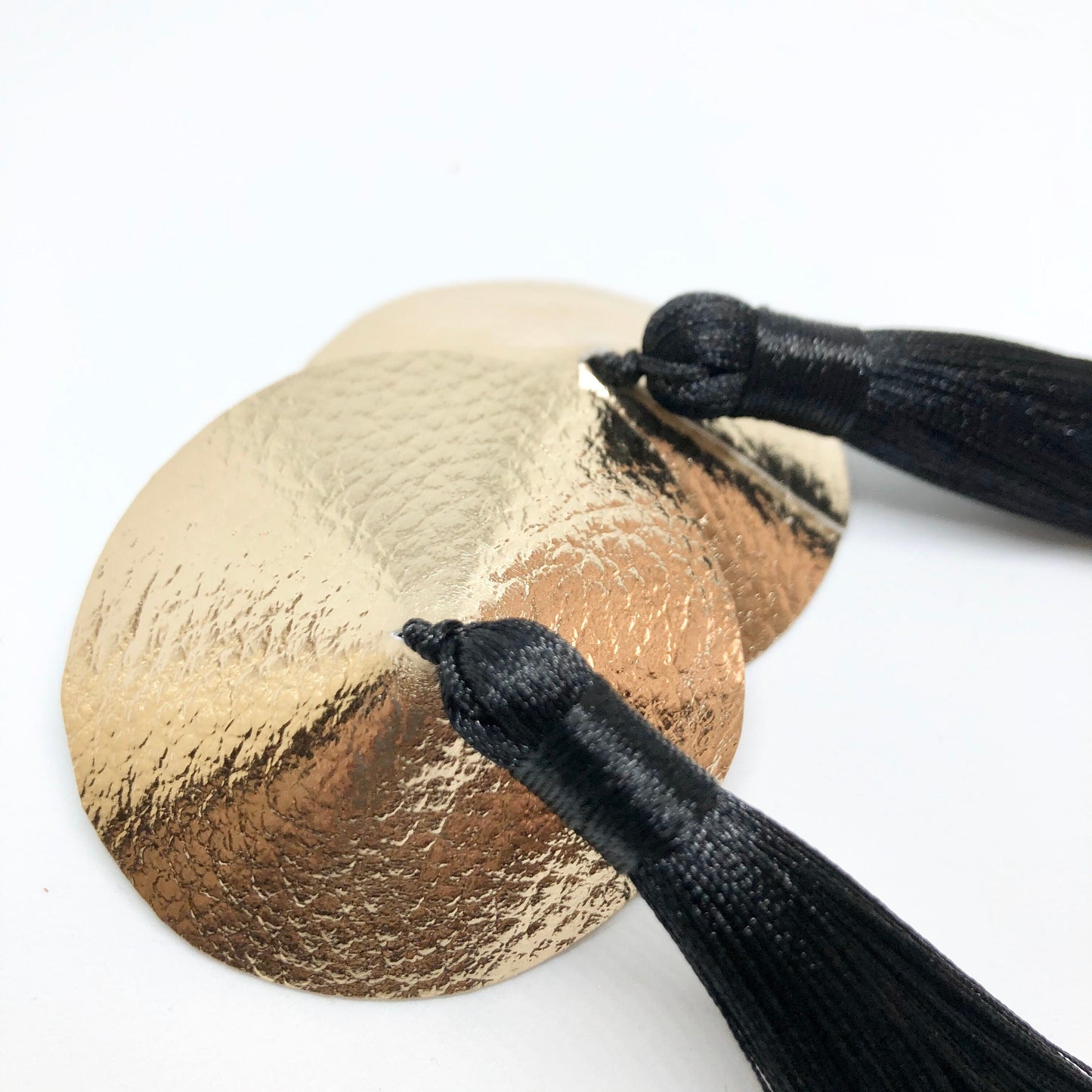 Gold faux leather burlesque pasties nipple covers with thick and long black silk tassels