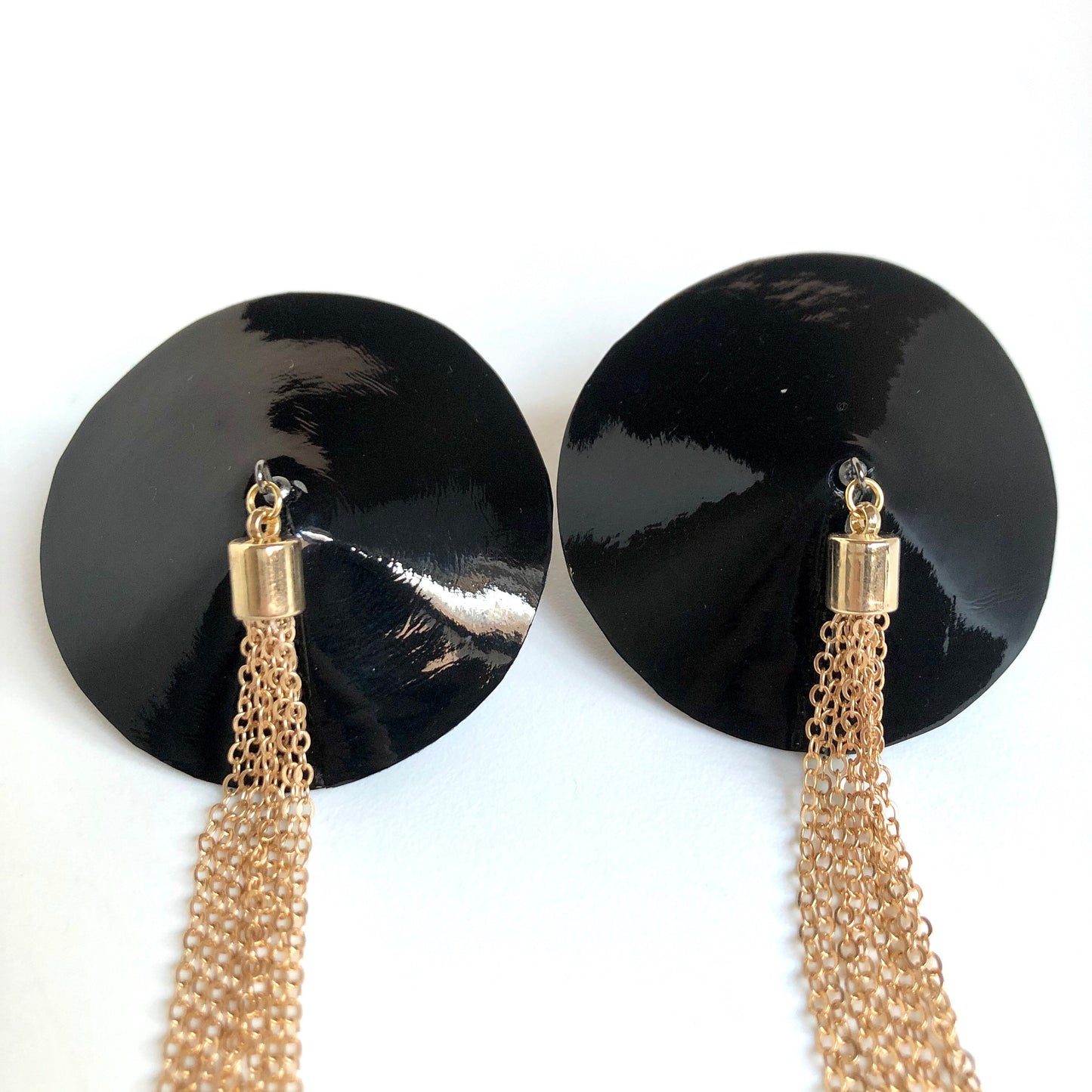 Black glossy patent faux leather burlesque pasties nipple covers with gold chain tassels