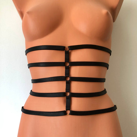 Black elastic waist cage harness on a mannequin - front