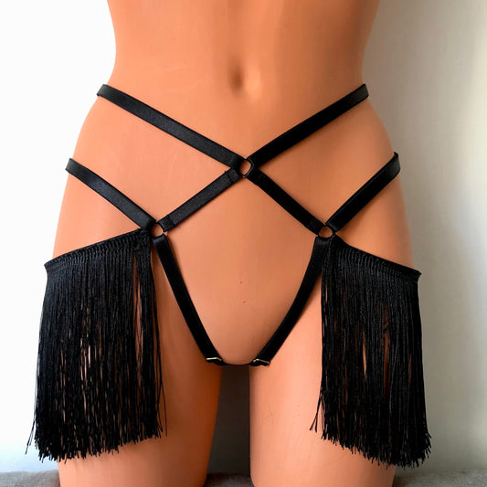 Black shimmy fringe open crotchless cage thong on a mannequin - front
