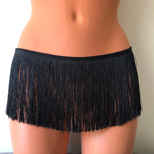 Black shimmy fringe hip harness belt skirt on a mannequin - front