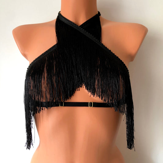 Black shimmy fringe twisted neck halter bra on a mannequin - front