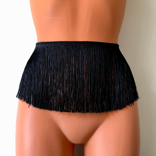 Black shimmy fringe belt skirt waist harness on a mannequin - front