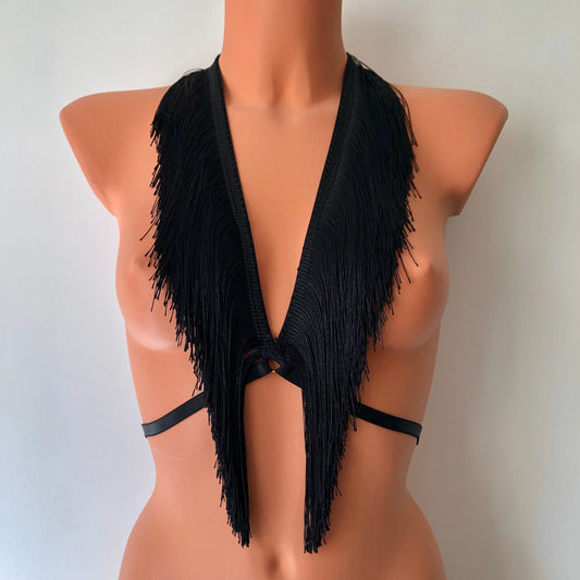 Black shimmy fringe chest harness on a mannequin - front