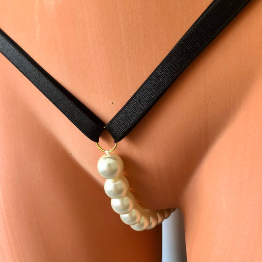 Extra large beaded pearl string thong on a mannequin - front diagonal