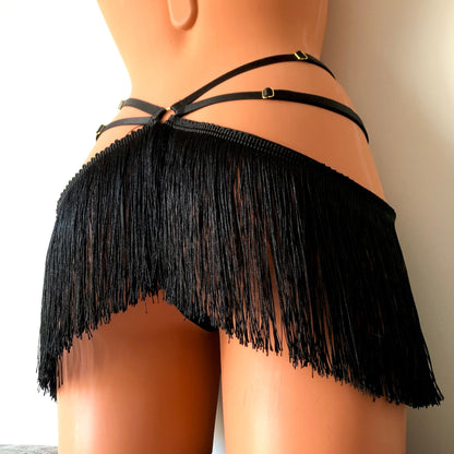 Black shimmy fringe open crotchless cage thong on a mannequin - back diagonal