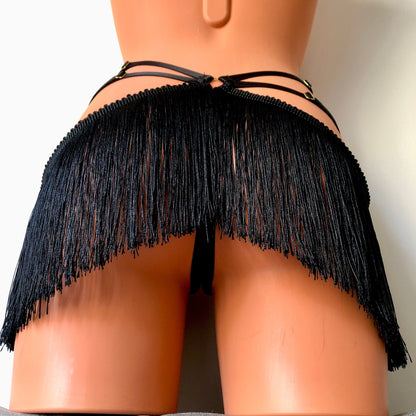Black shimmy fringe open crotchless cage thong on a mannequin - back