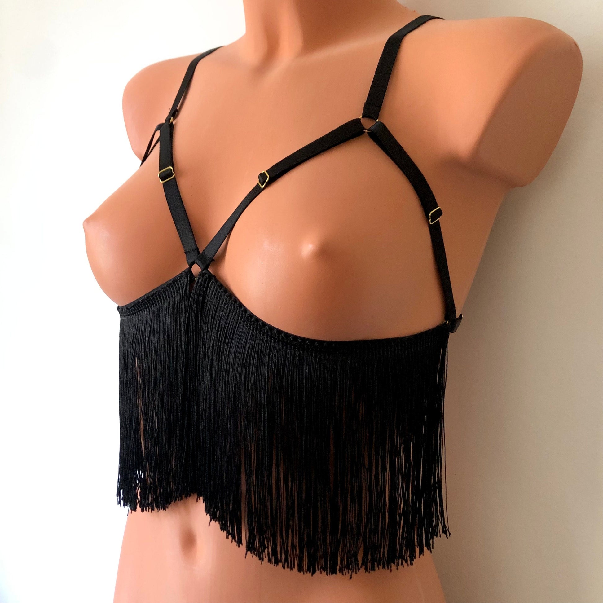 Black shimmy fringe cupless bra on a mannequin - front diagonal