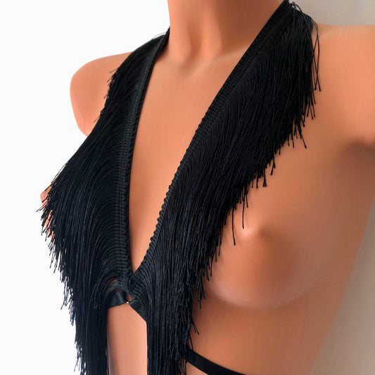 Black shimmy fringe chest harness on a mannequin - front diagonal