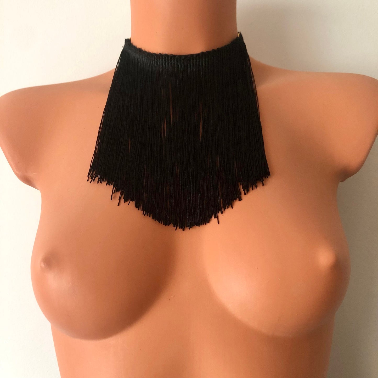 Black shimmy fringe choker on a mannequin - front
